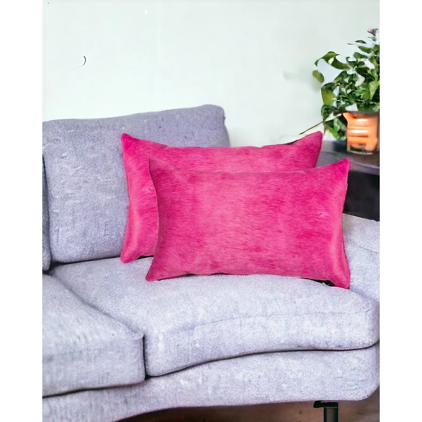 HomeRoots Set of Two 12" X 20" Fuchsia Cowhide Lumbar Throw Pillows